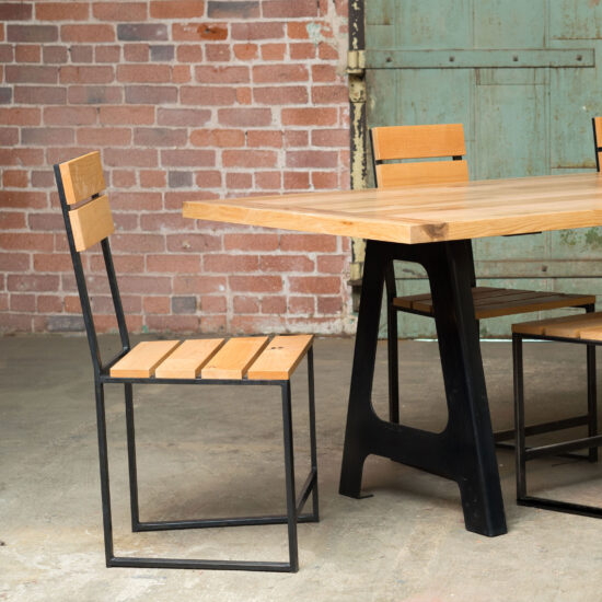 A-Frame Dining Table with Oak tabletop and blackened steel A-Frame legs with steel/wood chairs